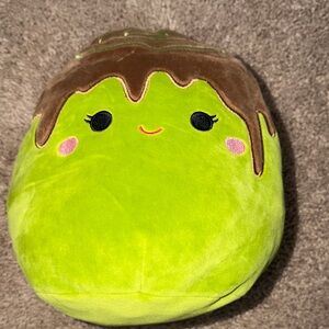 Squishmallows Malta the Matcha Cinnamon Roll 8-Inch Plush.